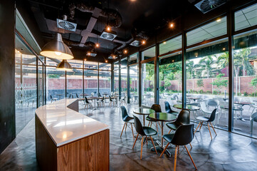 Modern cafe with chairs and tables