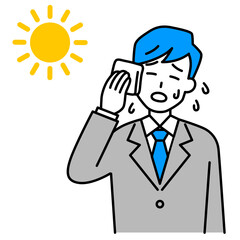 熱中症になるスーツの男性