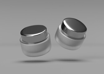 Two Elegant Silver-Lidded Glass Jars Floating on Gray Background