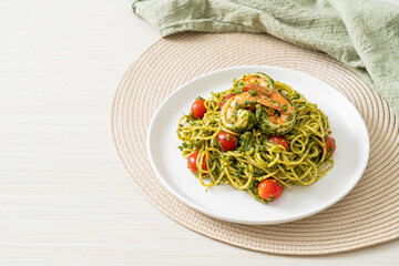 Spaghetti with prawns or shrimps in homemade pesto sauce