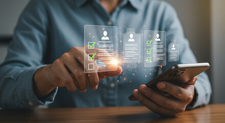 A person using a phone to check a series of profile application forms