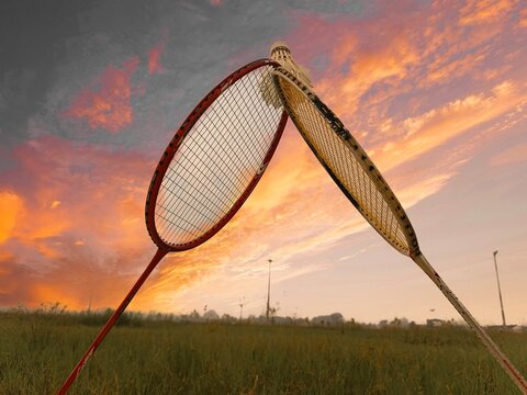 racket and shuttlecock in the afternoon