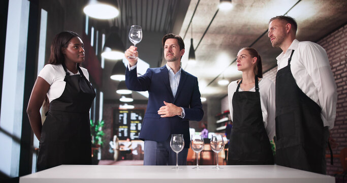 Professional Chef Conducts Hygiene Training For Restaurant Staff