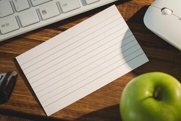 White paper between electronic equipments and apple © vectorfusionart