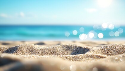 Stock photo of sandy beach with blue ocean water and clear sky background