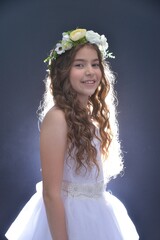 High resolution close up studio portrait of a single beautiful 12 year old Caucasian girl in a...