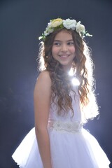 High resolution close up studio portrait of a single beautiful 12 year old Caucasian girl in a...