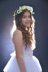 High resolution close up studio portrait of a single beautiful 12 year old Caucasian girl in a...