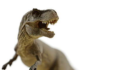 Obraz premium Close-up of a fierce T-Rex figurine with sharp teeth, capturing its menacing essence and primal power.