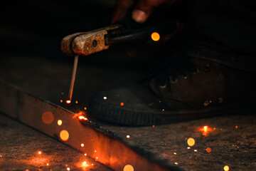 Closeup Steel welding with spark and fire