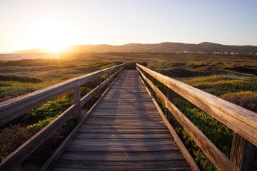 Fototapeta premium Wooden path leads to sunrise
