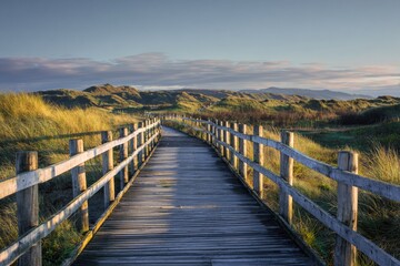 Obraz premium Sunrise boardwalk through dunes
