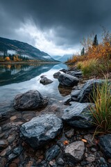 Fototapeta premium Calm lake reflecting autumn mountains