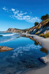 Obraz premium Coastal scene with calm water reflections