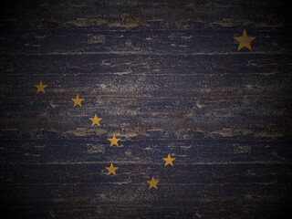 Obraz premium Old wooden Alaska state flag