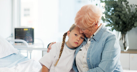 Hug, healthcare and sad with grandmother and child in hospital for support, pediatric patient and...