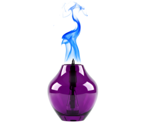 Modern purple glass diffuser with blue flame and smoke isolated on transparent background