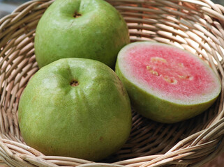 red guava fruit in basket