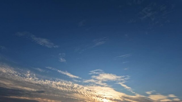 timelapse clip of small clouds at sundown after the rain for forecast