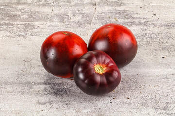 Black ripe juicy organic tomato
