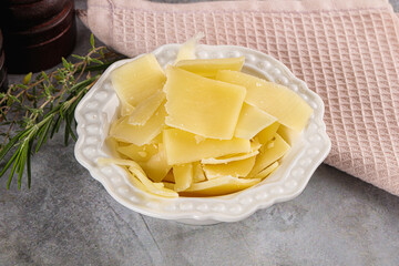 Parmesan cheese slices in the bowl