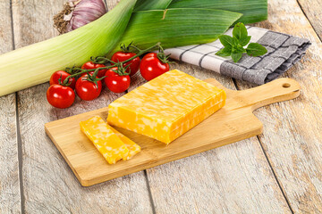 Marble yellow cheese with slices