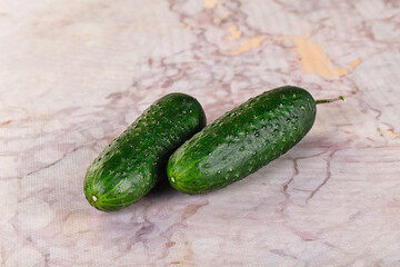 Ripe green raw two cucumbers