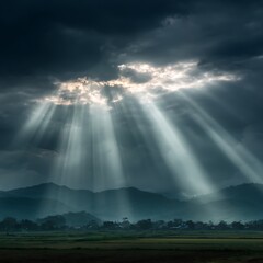 Crepuscular Rays Breaking Through Dark Clouds Over Mountains