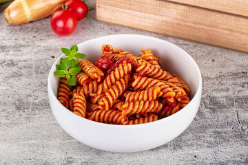 Italian fusilli pasta with tomatoes