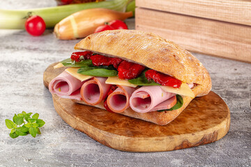 Ciabatta with mortadella, tomato, cheese and spinach