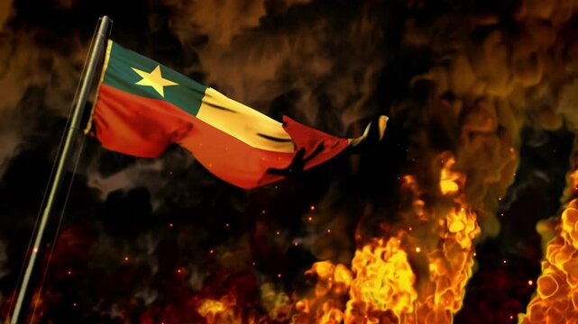 waving Chile flag on burning fire background - disaster concept