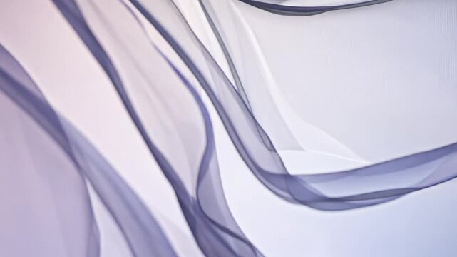 grey transparent fabric waving on the wind