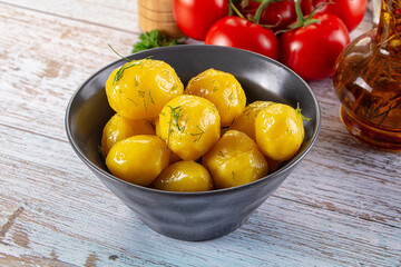 Boiled young potato with oil