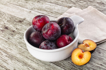 Ripe sweet juicy plum heap