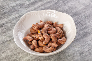 Unpeeled cashew nuts in the bowl