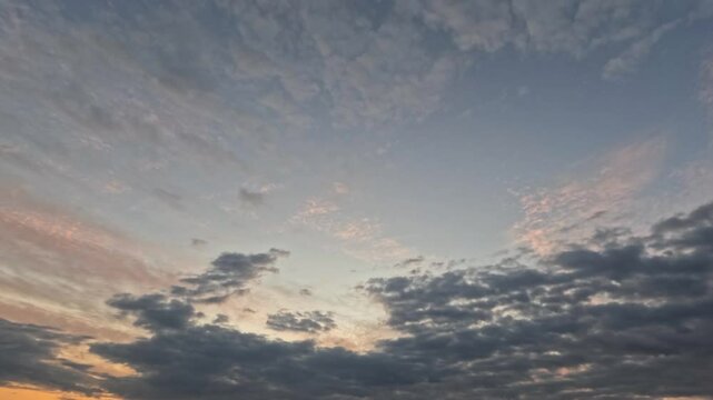 sky timelapse of snowy weather at night, dark massive clouds - loop video