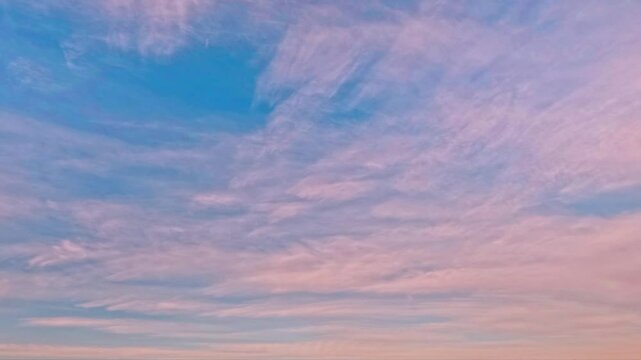 timelapse of the sky of fluffy clouds at sunrise after the rain for forecast