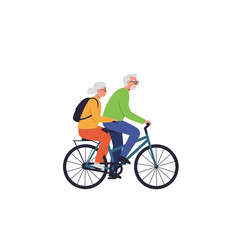 Fototapeta premium Active senior couple riding a bicycle together with smiles outdoors 