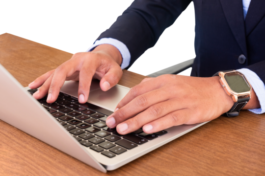 businessman typing on laptop