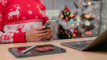 Celebrating Successful Online Payment For Festive Postholiday Sales On Wooden Table, Featuring Tablet And Cozy Christmas Holiday Background