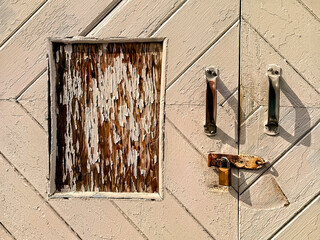 Padlock on a vintage old door.
