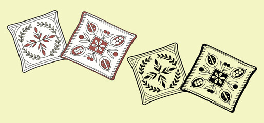 Decorative square patterned tiles featuring floral designs and geometric elements displayed on a light yellow backdrop