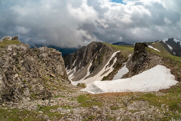 A snowy ledge on the edge of a cliff