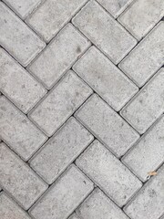 Rough Pavement Surface Formed By Gray Bricks