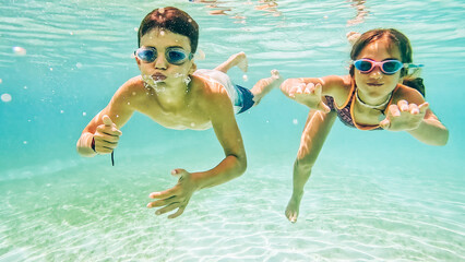 Children swimming at Kalanggaman Island, Malapascua, Cebu, Philippines