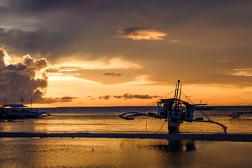 Boats in sunset at Malapascua island, Cebu, Philippines