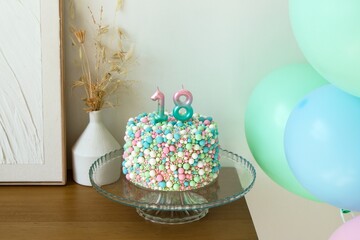 Celebratory 18th Birthday Cake with Colorful  Balloons, Festive Decoration in a pastel colors.