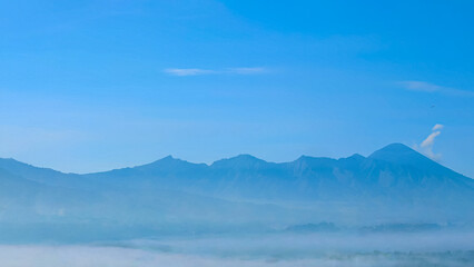 Blue Mountain Range Serenity in a Hazy Landscape Captured on a Clear Day