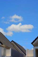 Photo OF The Bright Sunny Sky Over Rooftops