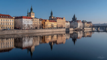 Naklejka premium serene view of pragues iconic architecture under clear blue sky devoid of people